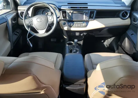 2014 Toyota Rav4 Limited z USA, uszkodzony, nr VIN 2T3YFREV2EW103112